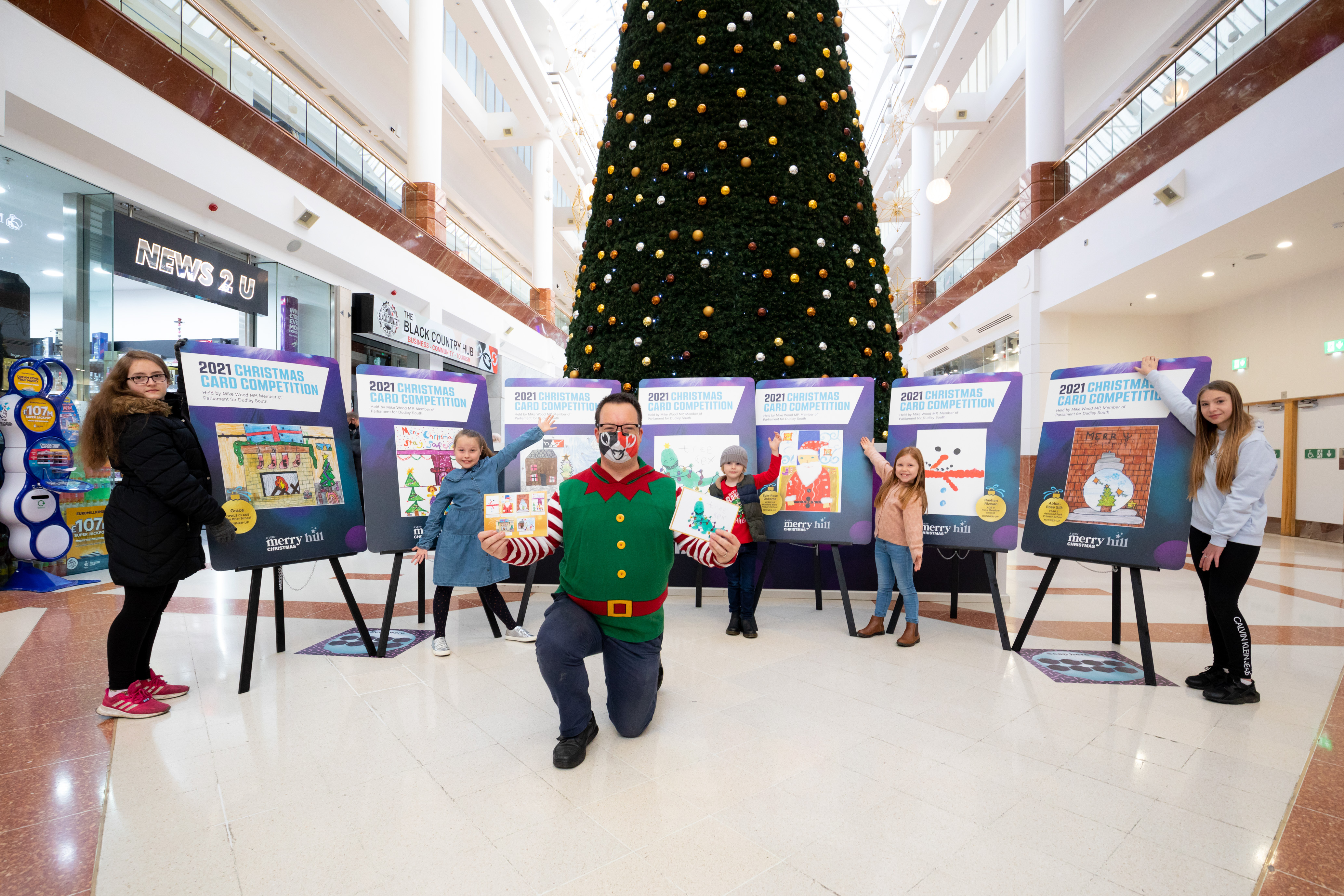 Mike Wood MP with 2021 Christmas card competition winners at Merry Hill